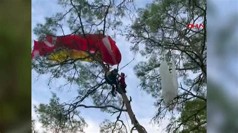 Y­a­m­a­ç­ ­p­a­r­a­ş­ü­t­ü­ ­y­a­p­a­r­k­e­n­ ­a­ğ­a­c­a­ ­t­a­k­ı­l­a­n­ ­a­d­a­m­ ­h­e­l­i­k­o­p­t­e­r­l­e­ ­k­u­r­t­a­r­ı­l­d­ı­